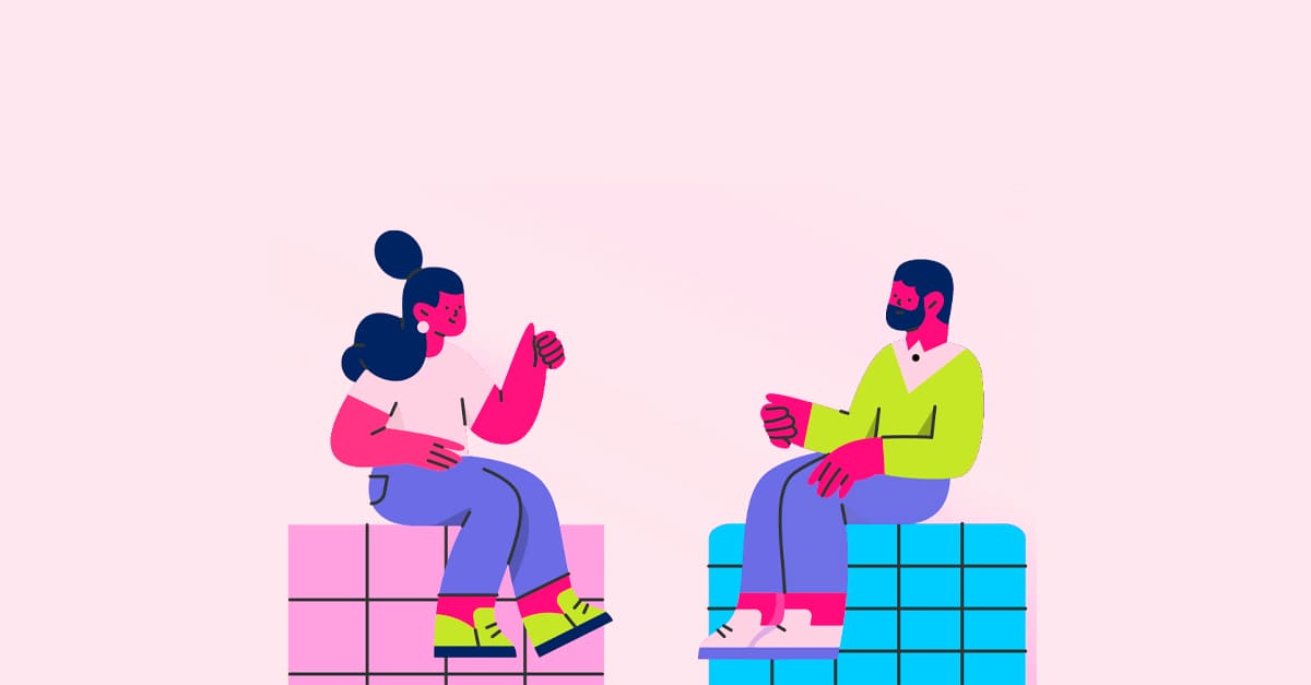 Duas pessoas conversando de forma descontraída